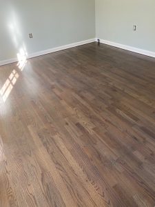 Hardwood floor refinishing with custom Ebony and Classic Gray stain in the Bicentennial Park area of Berlin Connecticut 06037