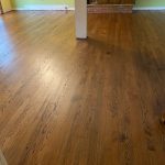 Refinished oak hardwood floors with dark stain and oil-based polyurethane showing natural wood grain in a Cromwell Connecticut home.
