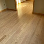 Refinished hardwood floors in a Middletown CT home with a fresh natural finish