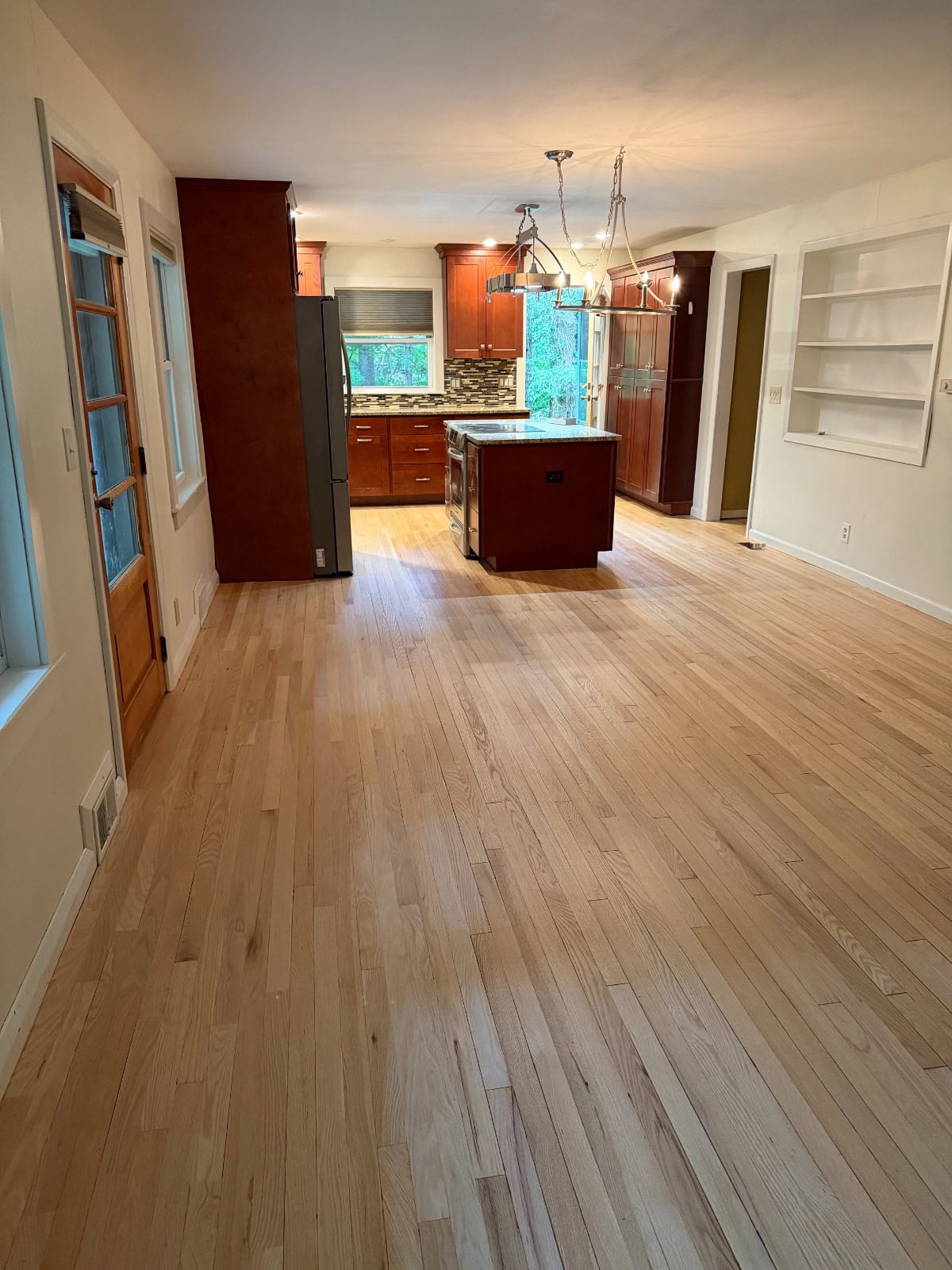 Finished hardwood floor repair and refinishing project in Manchester Connecticut