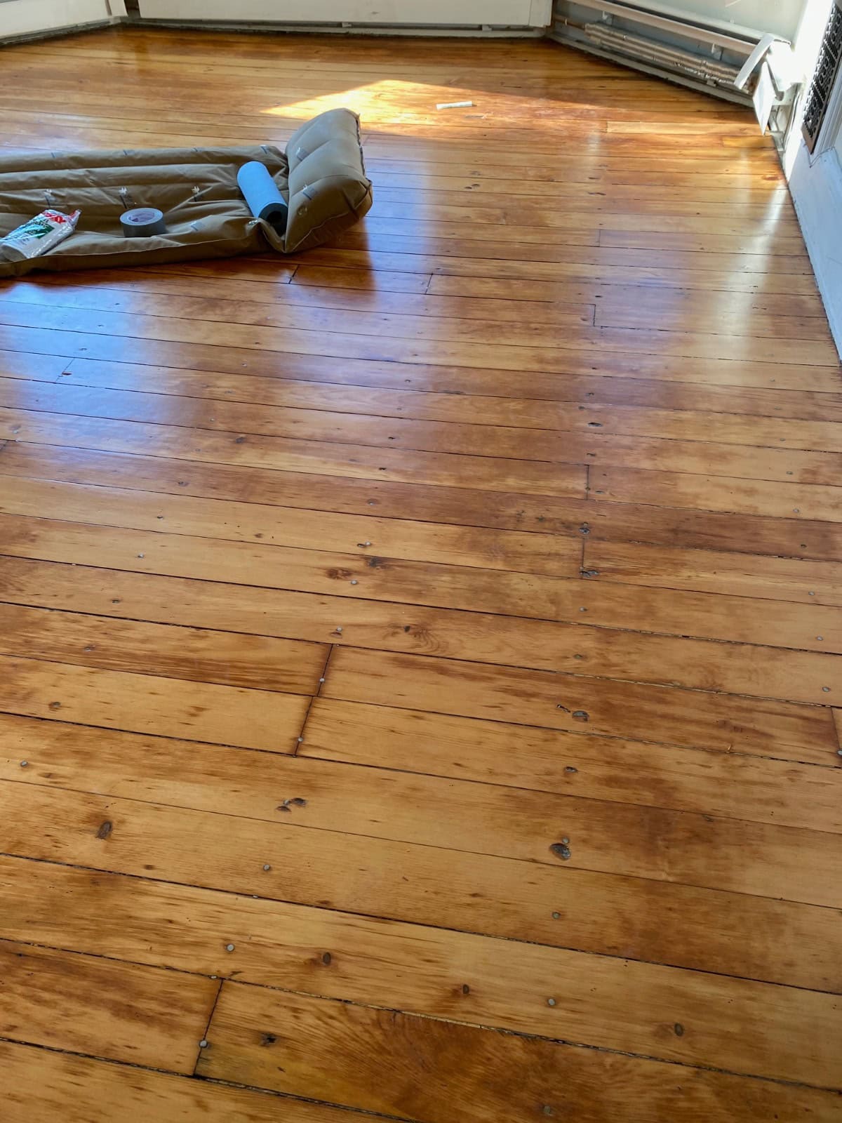 Historic pine hardwood floor in a 150-year-old West End Hartford Connecticut home before refinishing