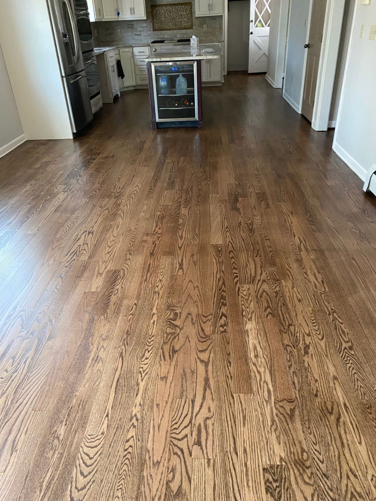 Whole-house hardwood floor refinishing with DuraSeal Provincial stain in Simsbury CT 06070