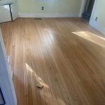 Finished hardwood floors after repairs sanding and water-based refinishing in a 90-year-old Wethersfield Connecticut home