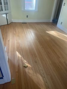 Finished hardwood floors after repairs sanding and water-based refinishing in a 90-year-old Wethersfield Connecticut home