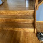 Red oak flooring finished with DuraSeal Weathered Oak stain and a Bona water-based finish in Granby, CT.