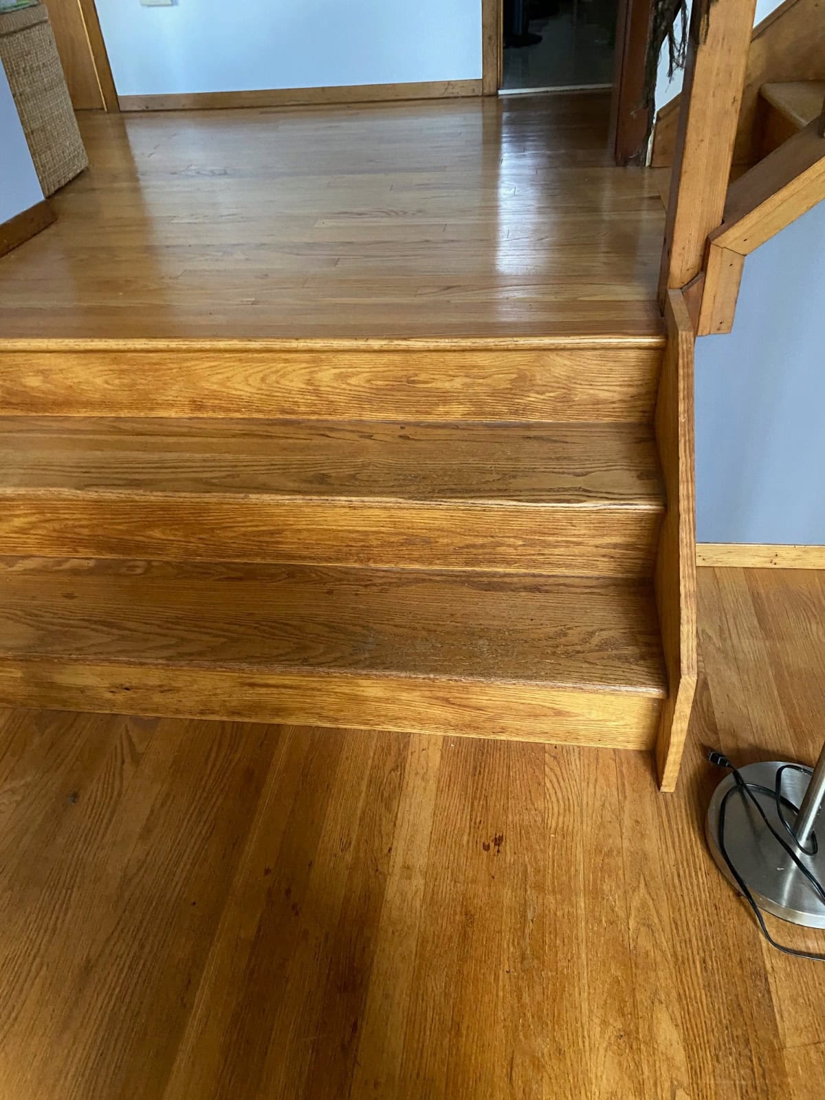 Red oak flooring finished with DuraSeal Weathered Oak stain and a Bona water-based finish in Granby, CT.