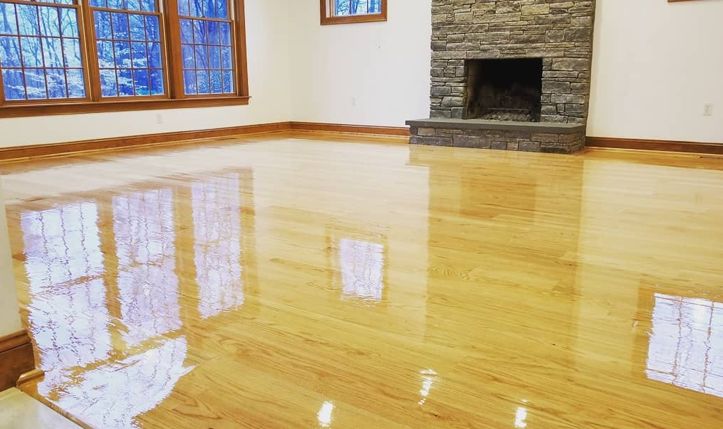 Final coat of finish Natural Hardwood Flooring Refinishing in